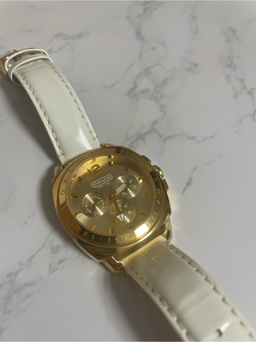 Coach Gold-Tone Chronograph Watch with White Patent Strap